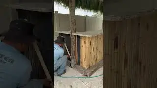 Seminole, Florida rethatching 12x12 tiki and bamboo replacement on an existing tiki bar