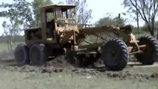 CAT 12 Motorgrader Smoothing a Road