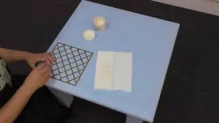 Painting a stencil on table top with Voodoo Molly Vintage Paint