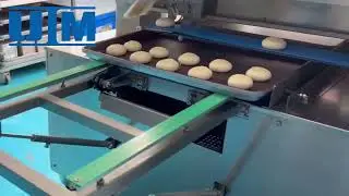 UIM Egg yolk pastry brushed with egg wash and sprinkled with sesame seeds