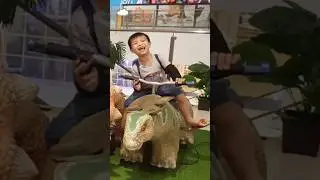 Heng rides dino through the mall | Kids electric dinosaur ride! 🦖