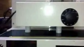 Induction Wad's sealing machine . High speed machine