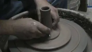 THROWING A WATERING CAN ON THE WHEEL PART 1.wmv