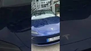 Tesla model 3 highland.  metallic blue.