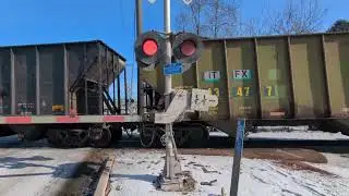 Southbound CN Manifest with a Citirail unit trailing second on the Leightion sub at JB tower