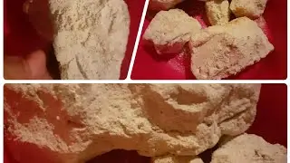 Lumps of white gypsum crumbled in a dry bowl