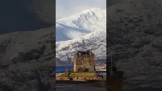 Another angle on Castle Stalker with the snow covered peaks in the distance #Scotland #CastleStalker