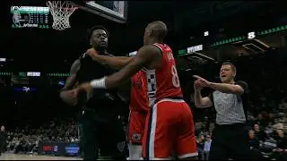 Kris Dunn shoves Julius Randle from behind, instigating a scuffle, gets ejected. Randle with a tech