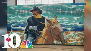 Knoxville artist paints four murals in Green McAdoo Gym in Clinton
