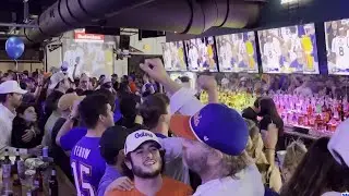 University of Florida basketball fans gather to watch and celebrate the Gator's win over Auburn
