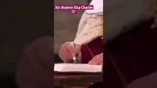 King Charles III signs his Coronation Oath.