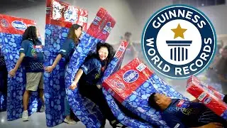 NEW: Longest Human Mattress Dominoes EVER! - Guinness World Records