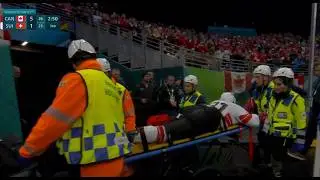 Kevin Fiala is stretchered off at the Olympics