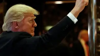 Washington state sues Trump over immigration order with support from Amazon and Expedia