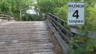 Denfield road bridge near London, Ontario. A look at the bridge plus 2 Via & 1 CN freight train.