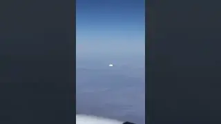 Airliner Passenger Films Strange UFO Cluster Flying Alongside Plane
