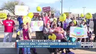 Drivers spread good cheer with Lubbock Adult Learning Center on World Smile Day