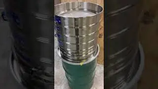Cannabis Hemp 20&rdquo; Dia. Stackable Sieve Separator with Pneumatic Motor Connected to a 55 Gal. Drum
