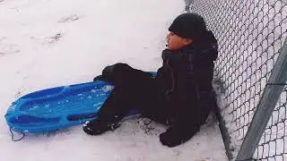 Sledding down a steep hill