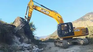 JCB Excavator Working With Hydraulic Breaker 