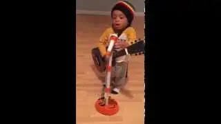 little boy named Myles Kingston sing a song Bob Marley 