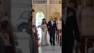 Bride walks down the aisle