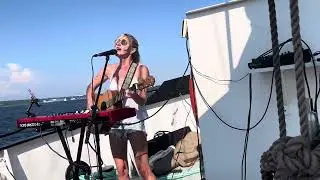 Brooklyn Blackmore singing paint the sky on the Tall Ship Silva