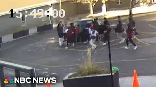 Watch students rescue mother and child trapped under car