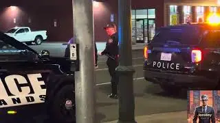 Redlands Cops talking. Cops see camera. Cops run off. 