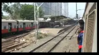 OVERTAKING A DC EMU & CROSSING A COLOURFUL RUPA FRONTLINE AD DC EMU AT ELPHINSTONE ROAD.mpg