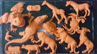 cleaning muddy animal toys,lion, cow, tiger, crocodile, zebra, goat, giraffe, elephant, sea horse