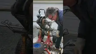 Honda TRX-70 rear axle removal