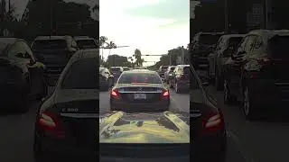 Driving in Miami through a school area, speed limit 15 MPH during posted hours