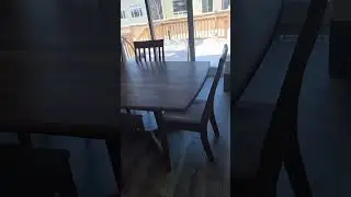 solid walnut dining table and chairs