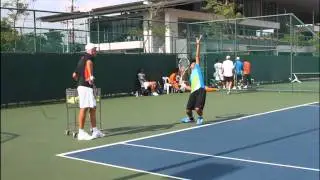 BUILT - SIRAWIT YUMUANG in serve-practice with TODD MARTIN on 19 May 2011 at LTAT, Thailand