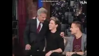 Niall Horan being kissed on the Late Show with David Letterman