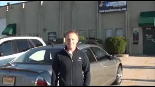 Customer reviews their purchase of a Ford Fusion from Excellence Cars Naperville IL