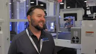 Allan Raimer from Edge-Sweets Company speaks to the Adhesives & Bonding Expo team