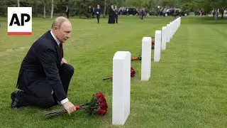 Putin lays flowers at graves for Soviet WWII pilots during Alaska visit