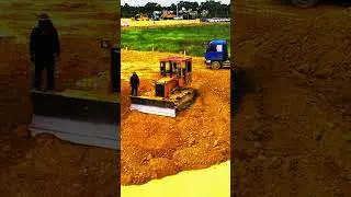 Heavy Machinery in Action  Bulldozer Pushing Soil to Dump Trucks EP035