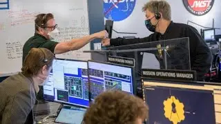 NASA's new space telescope opened its huge, gold-plated, flower-shaped mirror on Saturday, the final
