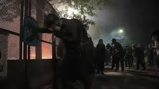 Protesters face off with federal agents on July 25, 2020 in Portland, OR.
