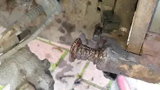 nissan almera rear brake caliper seized sliding pin removal