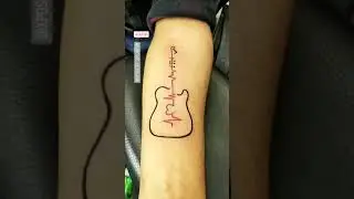 Guitar tattoo - Guitar tattoo design with heartbeat - Guitar Tattoo on hand