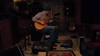 Dan Clare with his 8 string guitar