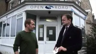 Douglas Carswell presents a cheque from yoosk.com to Open Road
