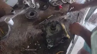 Car air conditioning compressor repair.