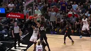 Caleb Martin puts Javale McGee on a poster