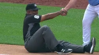 BAL@KC: Umpire Diaz dives for cover at third base