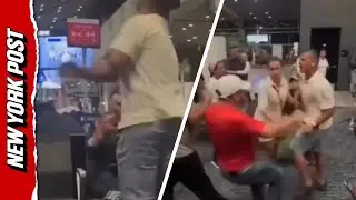 Vile video shows man SLAPPING woman for not giving up seat at airport terminal